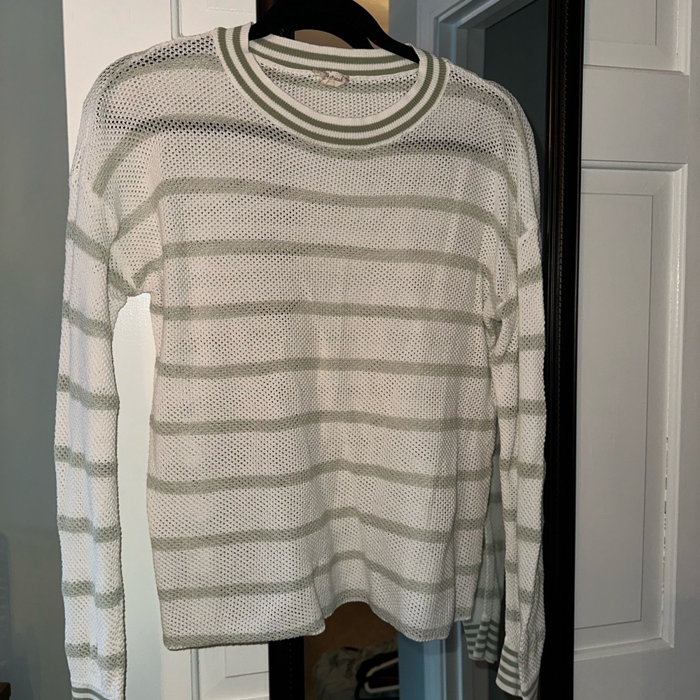 Green and white sweater